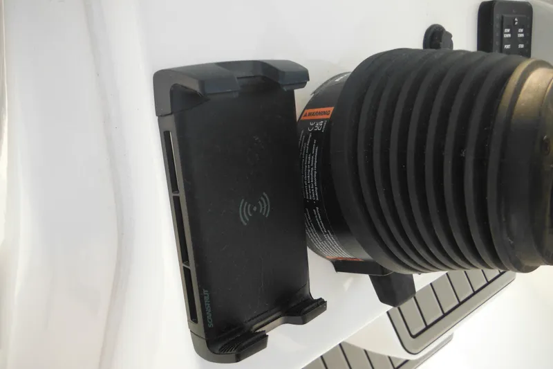Slide: The Image of Wireless charging pad on 2026 Tidewater 210 LXF boat dashboard. - 43