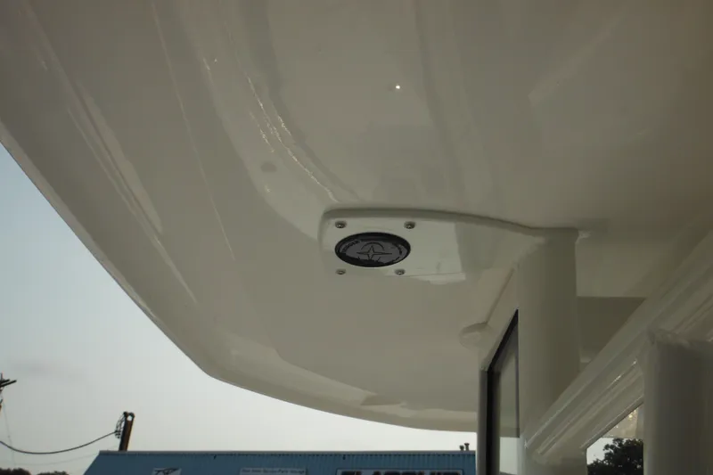 Slide: The Image of Close-up of 2026 Tidewater 210 LXF boat's sleek interior ceiling design. - 50