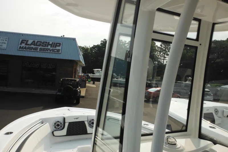 Slide: The Image of 2026 Tidewater 210 LXF boat at Flagship Marine Service, showcasing sleek design and modern features. - 51