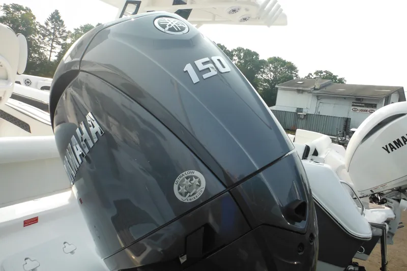 Slide: The Image of Yamaha 150 outboard motor on 2026 Tidewater 210 LXF boat, showcasing sleek design. - 6