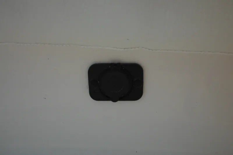 Slide: The Image of Black component on Tidewater 210 LXF boat, 2026 model, mounted on a white surface. - 66