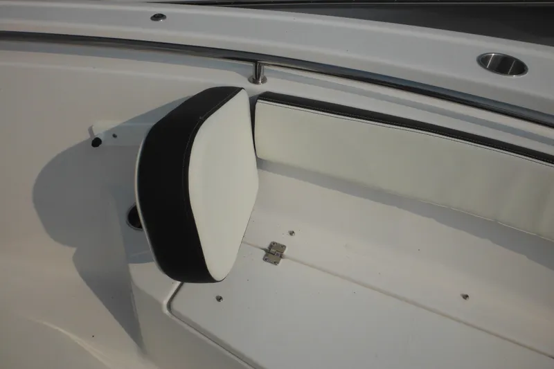 Slide: The Image of 2026 Tidewater 210 LXF boat interior with white cushioned seating. - 72