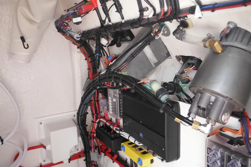 Slide: The Image of Wiring and components inside a 2026 Tidewater 210 LXF boat. - 76