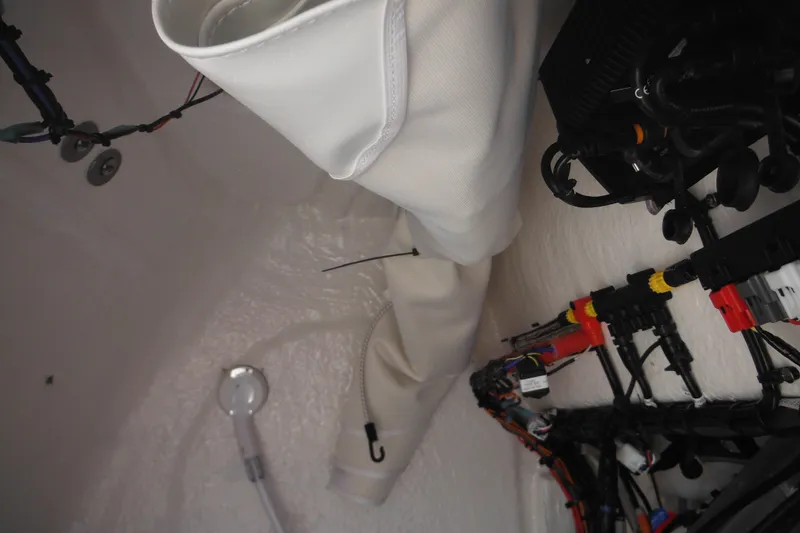 Slide: The Image of Interior view of 2026 Tidewater 210 LXF boat showing wiring and components. - 77