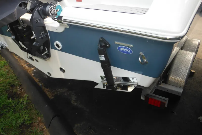 Slide: The Image of 2026 Tidewater 210 LXF boat on trailer, featuring outboard motor and ABYC certification. - 9