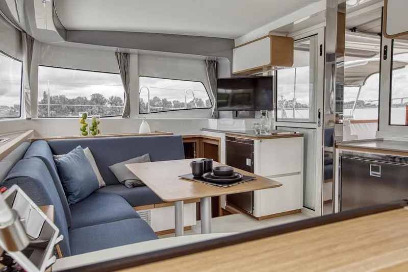 Slide: The Image of Luxurious interior of 2020 Excess 12 yacht with modern dining and kitchen area. - 2