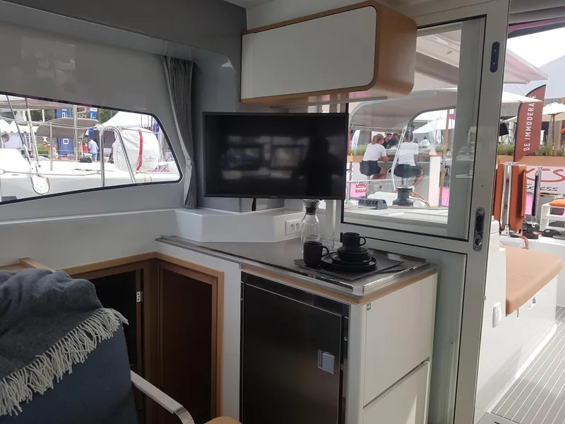 Slide: The Image of Interior of 2020 Excess 12 yacht with kitchenette and TV. - 5