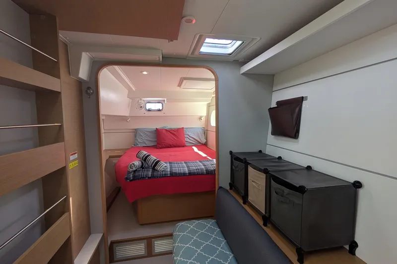 Slide: The Image of Interior of 2020 Excess 12 yacht cabin with bed, storage, and skylight. - 9