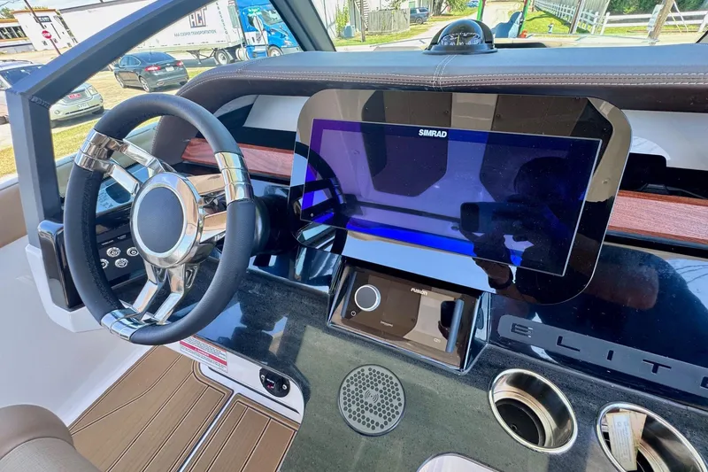 Slide: The Image of 2026 Monterey Elite 27 OB dashboard with steering wheel and touchscreen display. - 20