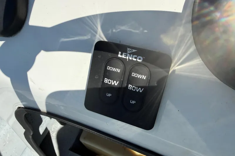 Slide: The Image of Lenco trim tab control panel on a Destiny 190 TV boat, 2004 model. - 16