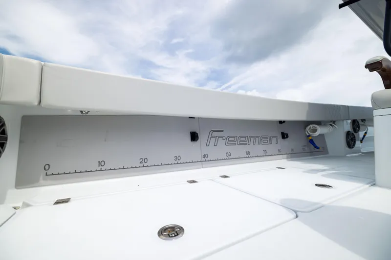 Slide: The Image of Freeman 42 LR 2025 boat deck with measurement scale and logo. - 29