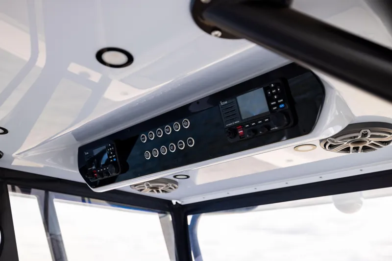 Slide: The Image of 2025 Freeman 42 LR boat console with modern controls and speakers. - 37