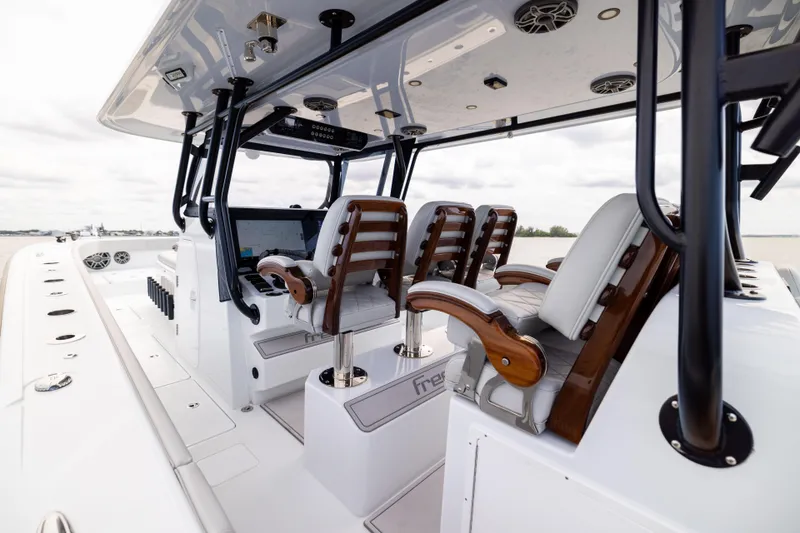 Slide: The Image of Luxurious 2025 Freeman 42 LR boat interior with sleek seating and modern design. - 39