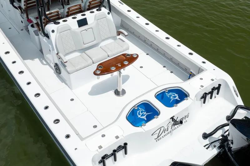Slide: The Image of Luxurious 2025 Freeman 42 LR boat with elegant seating and fishing amenities. - 4