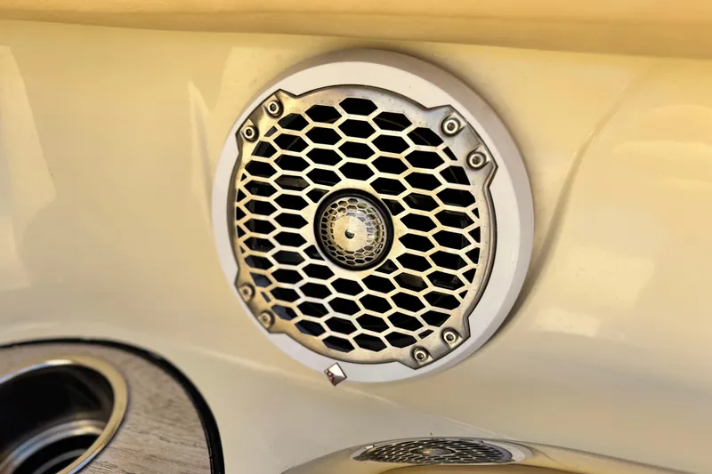 Slide: The Image of Close-up of a speaker on a 2013 Chris-Craft Launch 22 boat. - 14