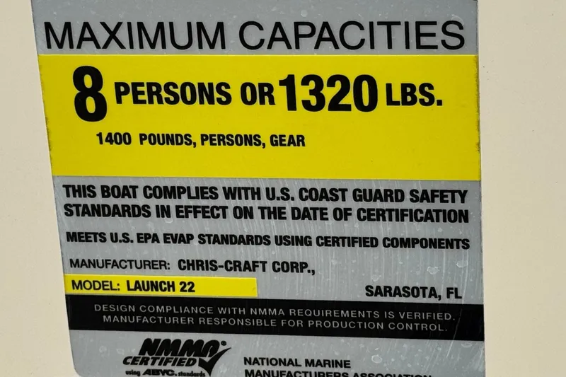 Slide: The Image of Capacity label for 2013 Chris-Craft Launch 22, 8 persons or 1320 lbs, U.S. Coast Guard compliant. - 29