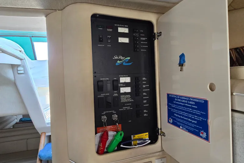 Slide: The Image of Electrical panel inside 1995 Sea Ray 330 Sundancer boat cabin. - 25