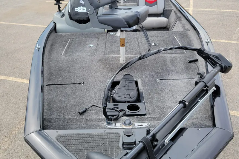 Slide: The Image of 2014 Tracker Pro Team 175 TXW fishing boat with trolling motor and seating. - 2