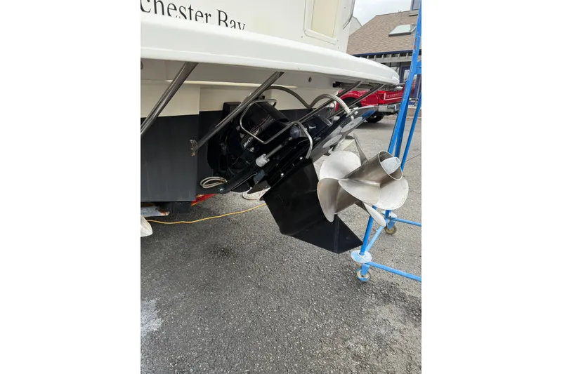 Slide: The Image of 2007 Bayliner 246 Discovery boat propeller and stern drive on display. - 6