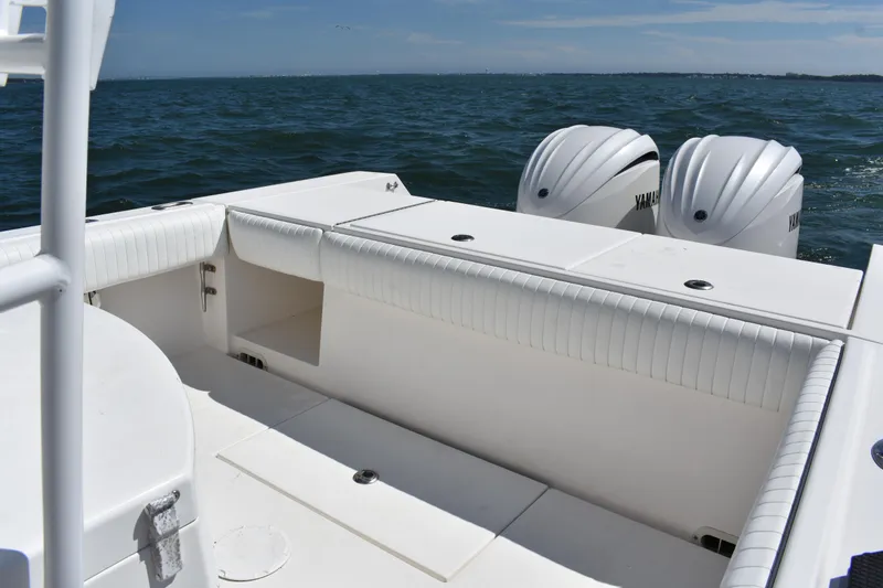 Slide: The Image of 2008 Regulator 32 Forward Seating boat with twin Yamaha engines on open water. - 31