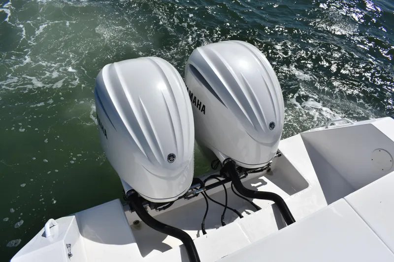Slide: The Image of Twin Yamaha outboard engines on a 2008 Regulator 32 Forward Seating boat. - 35