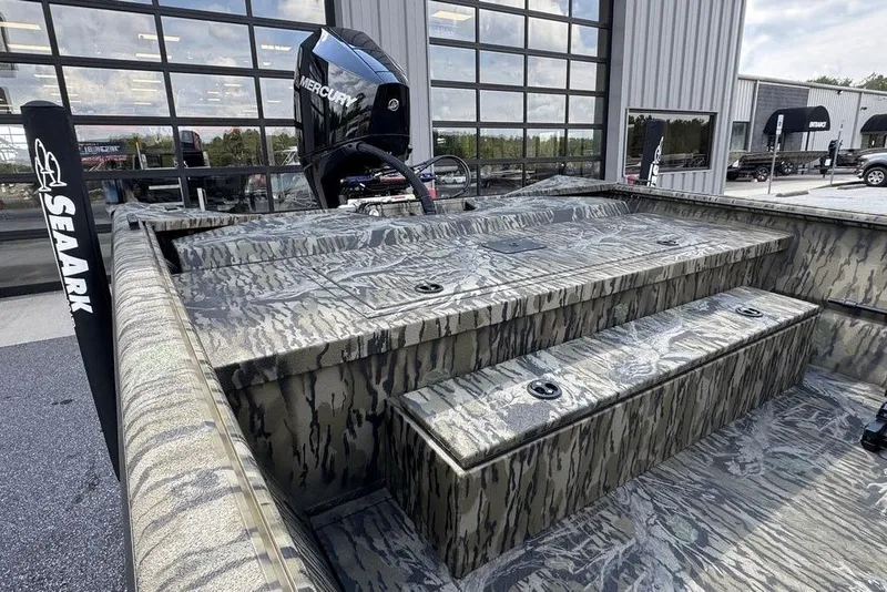 Slide: The Image of 2026 SeaArk 2272 MV FlatKat boat with camouflage design and Mercury outboard motor. - 7