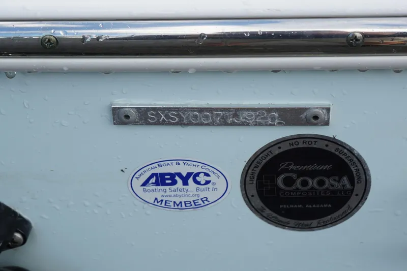 Slide: The Image of 2020 Seahunt 234 Ultra boat with ABYC and Coosa Composites labels. - 5