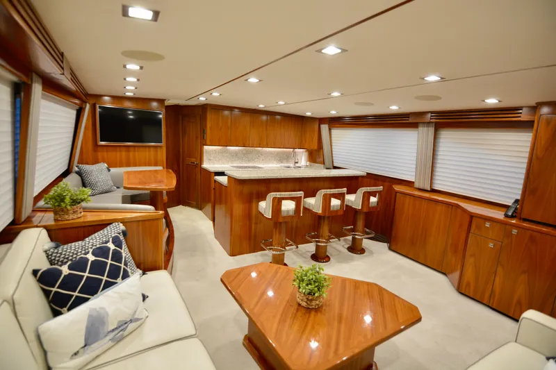 Slide: The Image of Luxurious interior of 2019 Viking 68 Convertible yacht with elegant wood finishes and modern amenities. - 3