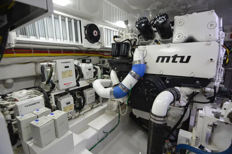Slide: The Image of Engine room of 2019 Viking 68 Convertible yacht featuring MTU machinery and Dometic systems. - 37