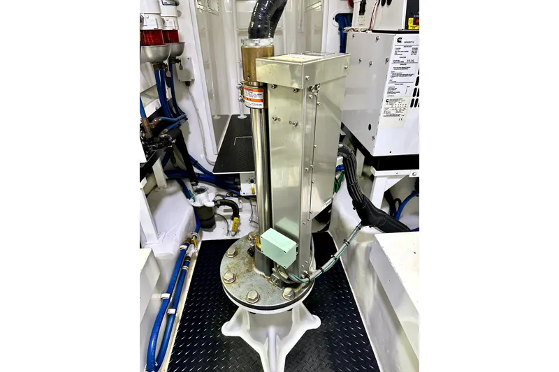 Slide: The Image of Engine room of 2019 Viking 68 Convertible yacht with mechanical equipment. - 65