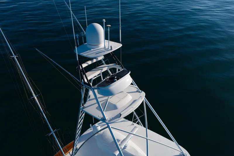 Slide: The Image of Aerial view of 2019 Viking 68 Convertible yacht tower on calm water. - 71
