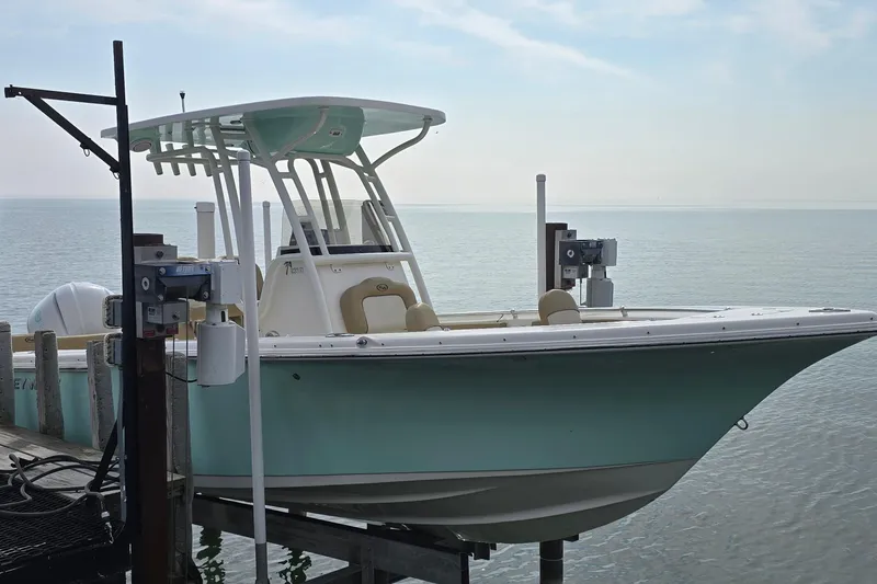 The Image of 2020 Key West 239 FS boat docked by the sea under a clear sky. - 1