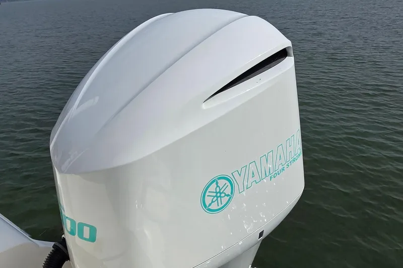 Slide: The Image of Yamaha outboard motor on 2020 Key West 239 FS boat, floating on water. - 27