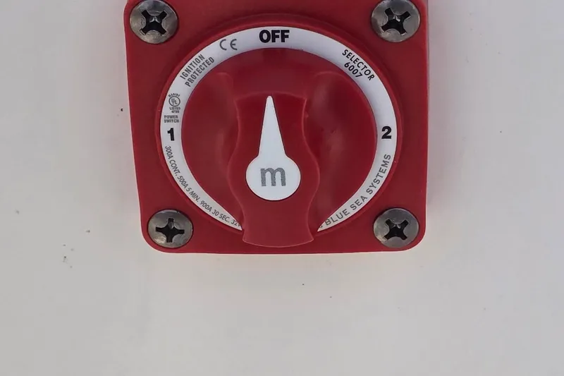 Slide: The Image of Red battery switch on 2020 Key West 239 FS boat, labeled "Blue Sea Systems." - 6