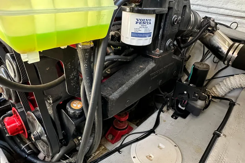 Slide: The Image of Engine compartment of a 2002 Chris-Craft Launch 28 with Volvo Penta oil filter. - 19