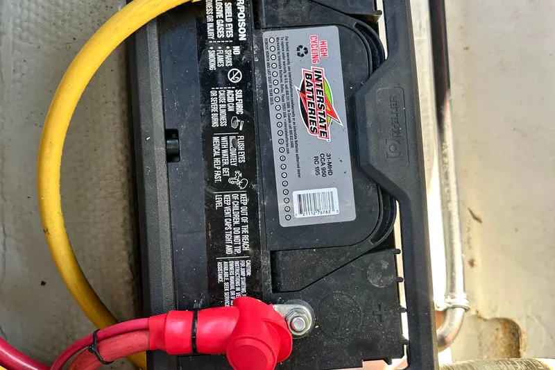 Slide: The Image of Interstate battery in 2002 Chris-Craft Launch 28 boat, with yellow and red cables. - 26