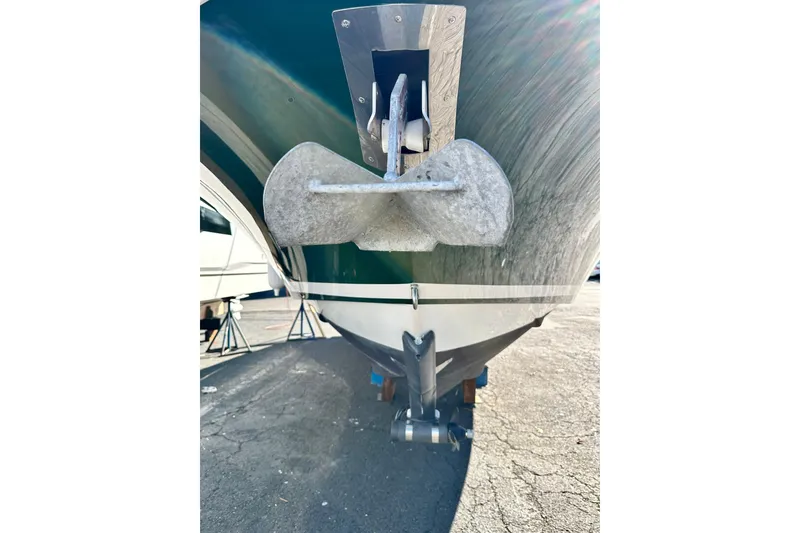 Slide: The Image of 2002 Chris-Craft Launch 28 boat anchor and hull detail in sunlight. - 34