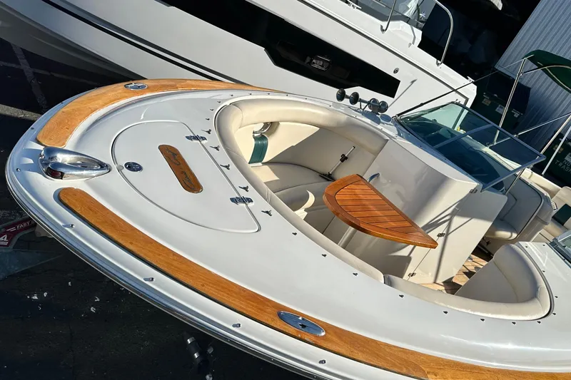 Slide: The Image of 2002 Chris-Craft Launch 28 boat with elegant wood accents and spacious seating. - 38