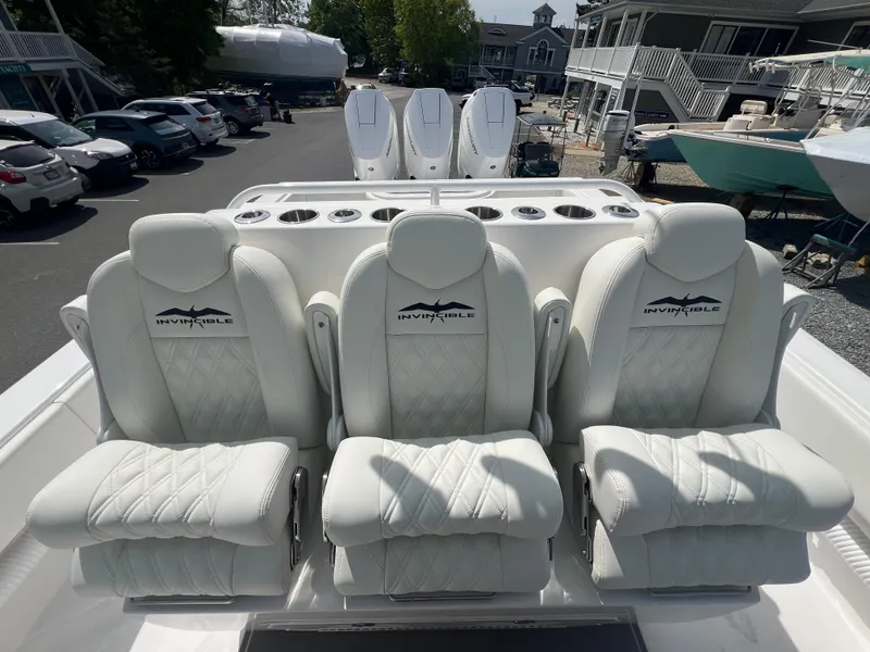 Slide: The Image of 2024 Invincible 39 Open Fisherman boat with luxurious white seating. - 8