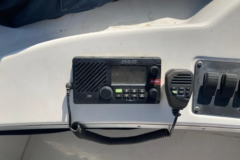 Slide: The Image of VHF radio system on 1999 Bayliner 3388 Command Bridge Motoryacht dashboard. - 27