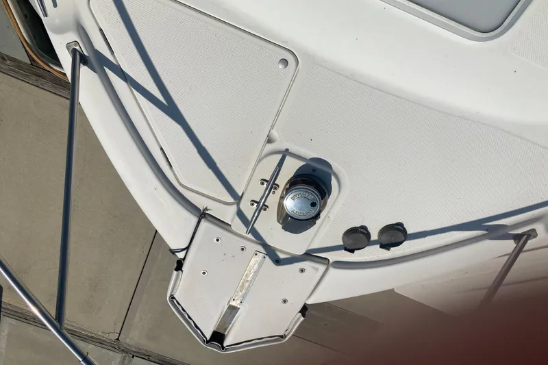 Slide: The Image of 1999 Bayliner 3388 Command Bridge Motoryacht deck with railing and fittings. - 9