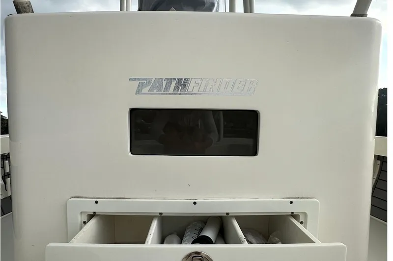 Slide: The Image of 2019 Pathfinder 2500 Hybrid boat storage compartment with open drawer. - 10