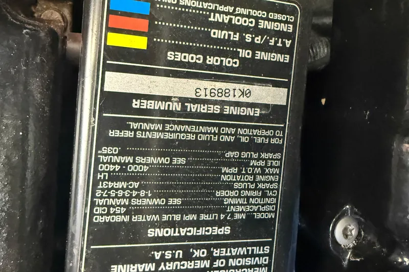 Slide: The Image of Engine specifications label on a 1997 Wellcraft 3300 Coastal boat. - 14
