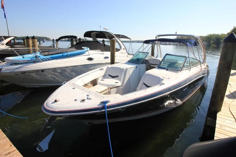 Slide: The Image of 2008 Four Winns 310 Horizon boat docked on a sunny day. - 1