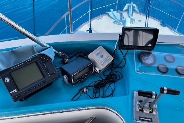 Slide: The Image of 1973 Tollycraft 40' Aft Cabin helm with navigation equipment and controls. - 7