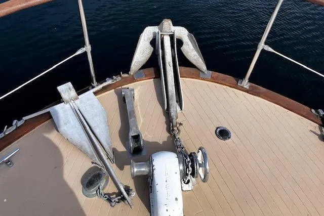 Slide: The Image of 1973 Tollycraft 40' Aft Cabin boat deck with anchor and winch system. - 8