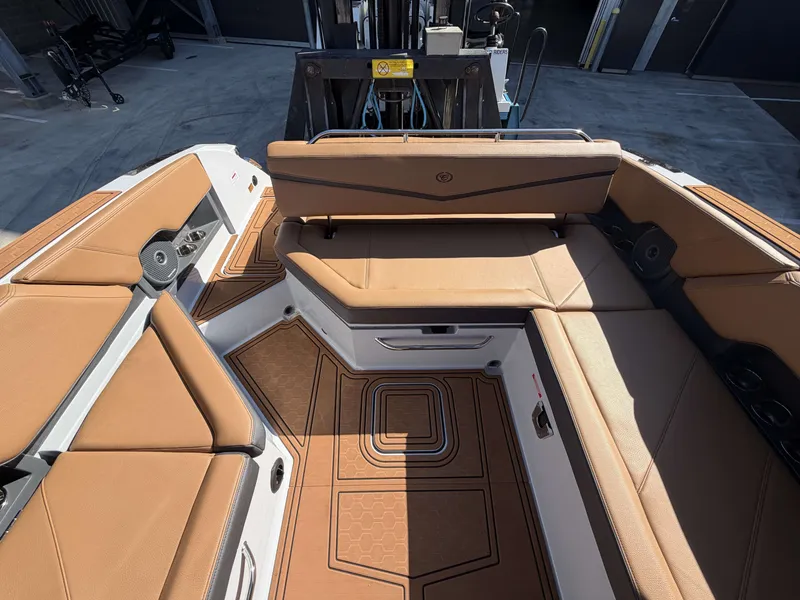 Slide: The Image of Interior of 2026 Cobalt R8 Surf with brown leather seating. - 9