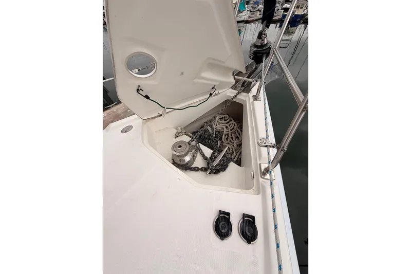 Slide: The Image of Anchor locker of 2009 Hunter 38 sailboat with chain and rope storage. - 11
