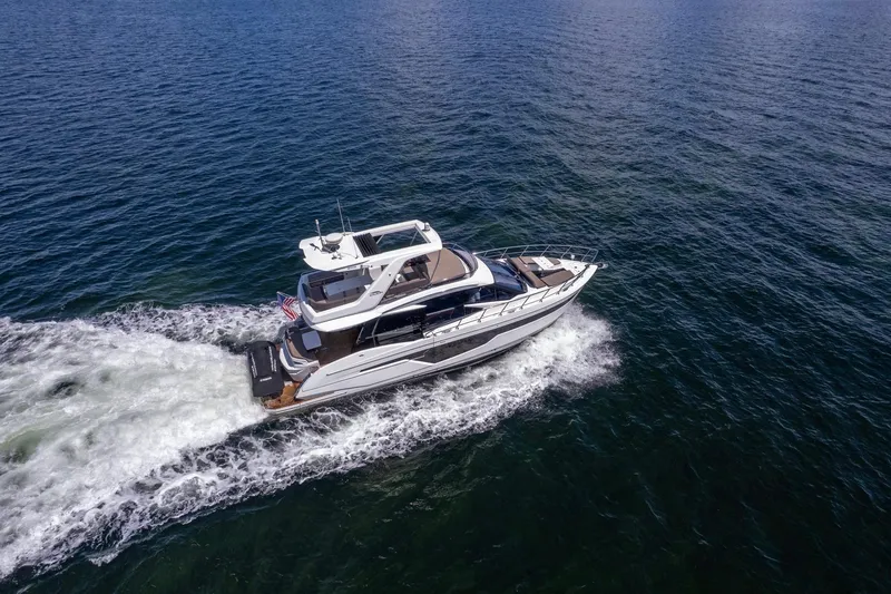 Slide: The Image of Aerial view of 2021 Galeon 500 Fly yacht cruising on open water. - 17