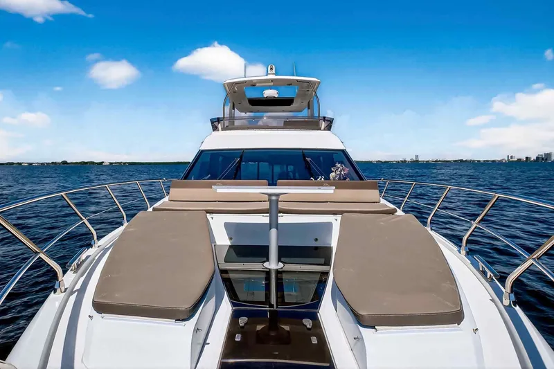 Slide: The Image of 2021 Galeon 500 Fly yacht on open water, featuring spacious deck and luxurious design. - 29